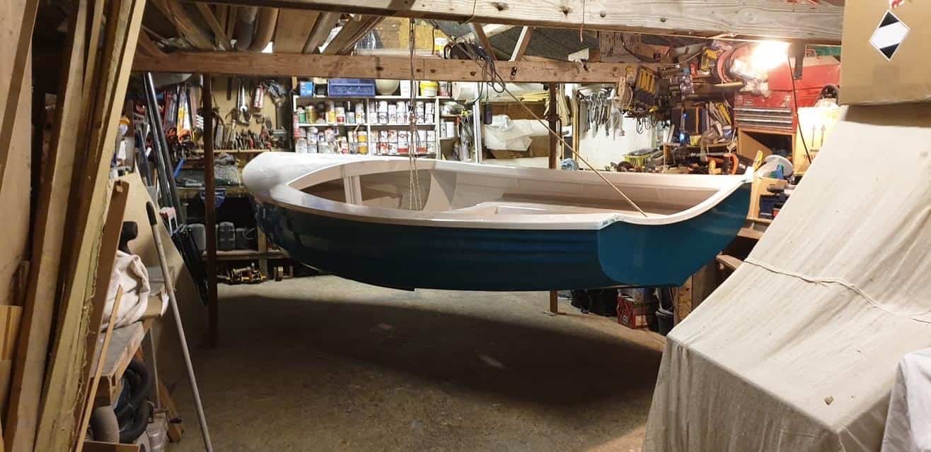 A brand new Blue YW Dayboat in the workshop.